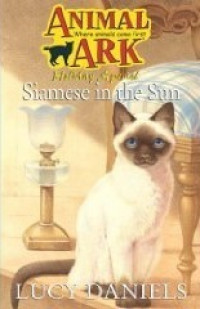 Image of Siamese in the sun